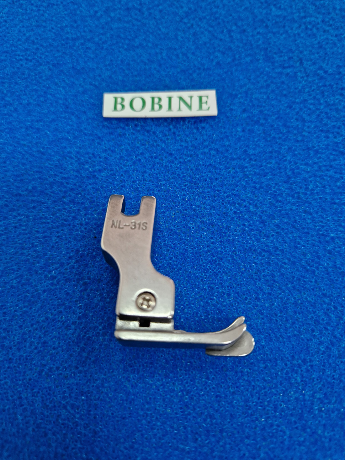 Calcador Compensador Esquerdo C/ Guia Central NL-31S